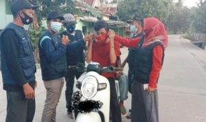 Meminimalisir Dini Penyebaran Covid Bagi Pendatang, Satgas Desa Lentu Bagi Vitamin dan Masker