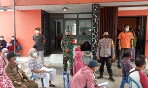 Pastikan Aman, Pembagian BST Dikawal Personil TNI-Polri